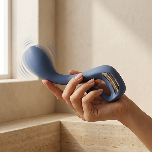 Blue Mellifonics wand vibrator held in one hand