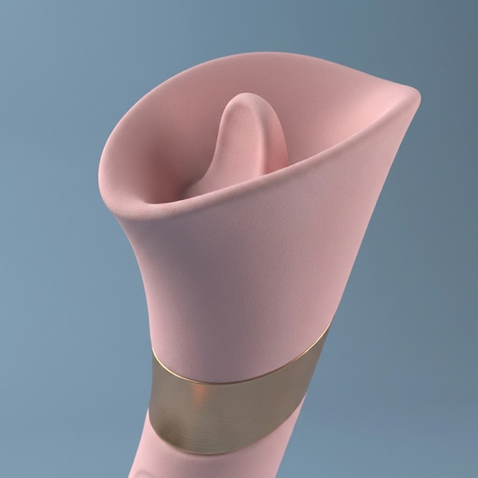 Close-up of Petal vibrator's flower-shaped suction opening showing soft silicone petal tip and gold accent ring detail