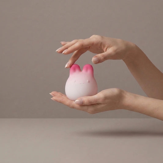 Luna bunny massager with squeeze-control design by Olyon